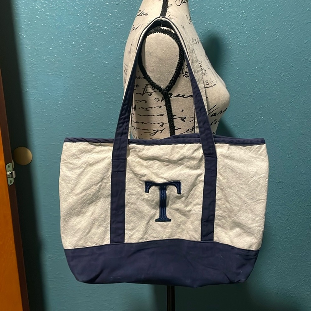 Nantucket fabric beach bag or tote w/the initial T on it. Cream & blue tote.